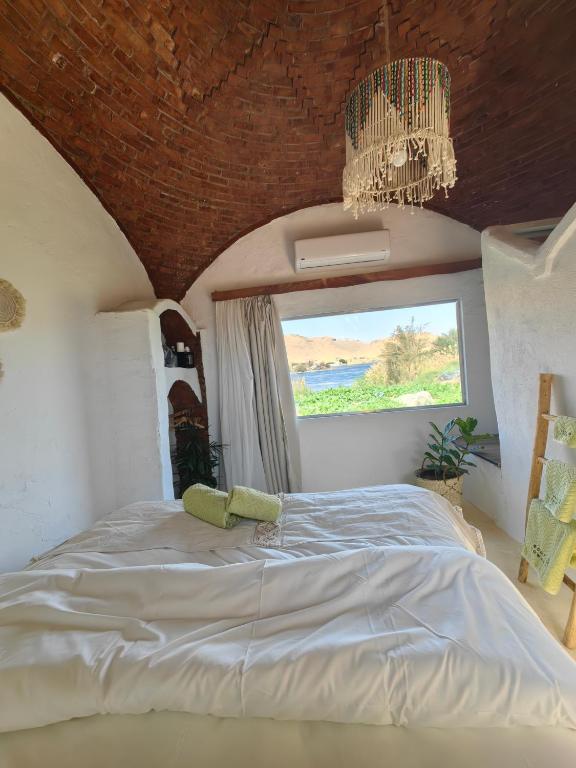 Postel nebo postele na pokoji v ubytování Nala Narty Boutique Hotel & Farm