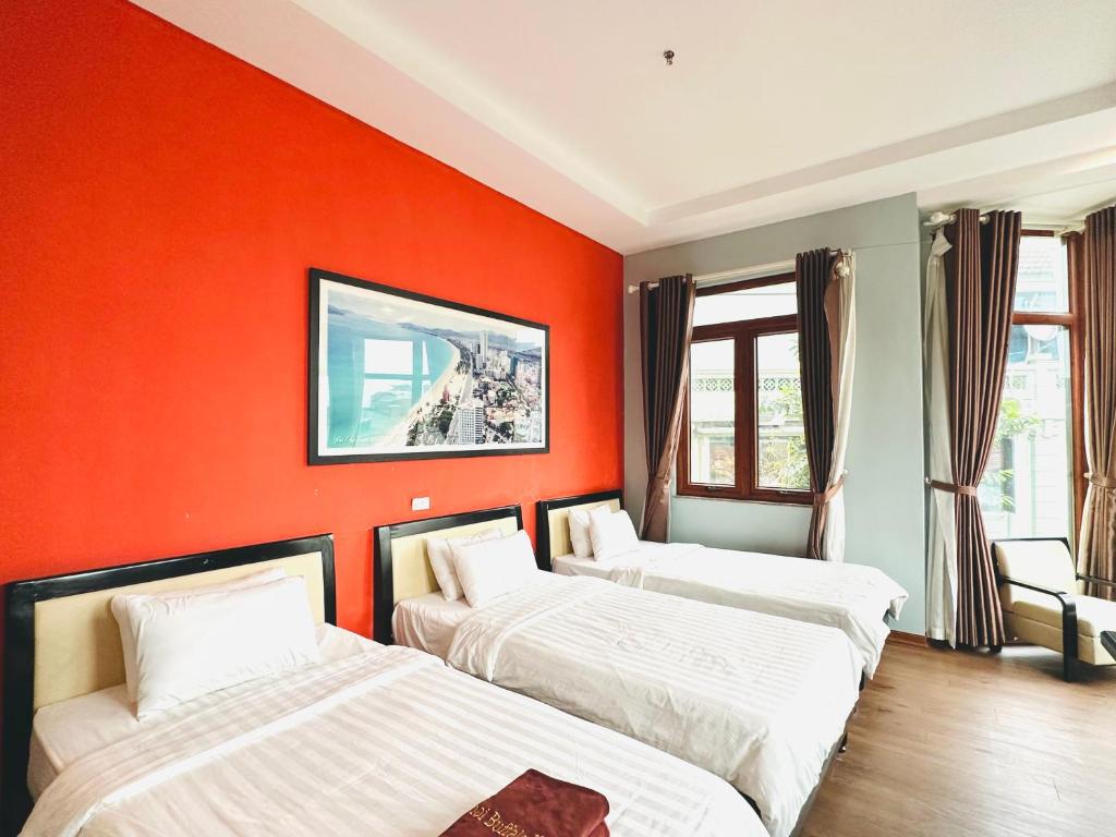 Postel nebo postele na pokoji v ubytování Hanoi Buffalo Hostel