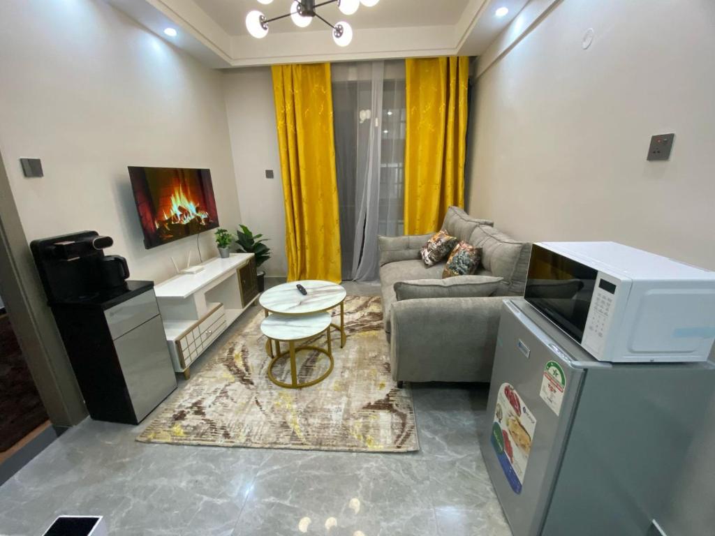 Η κουζίνα ή μικρή κουζίνα στο Sanctum comfy Homes at Kindaruma