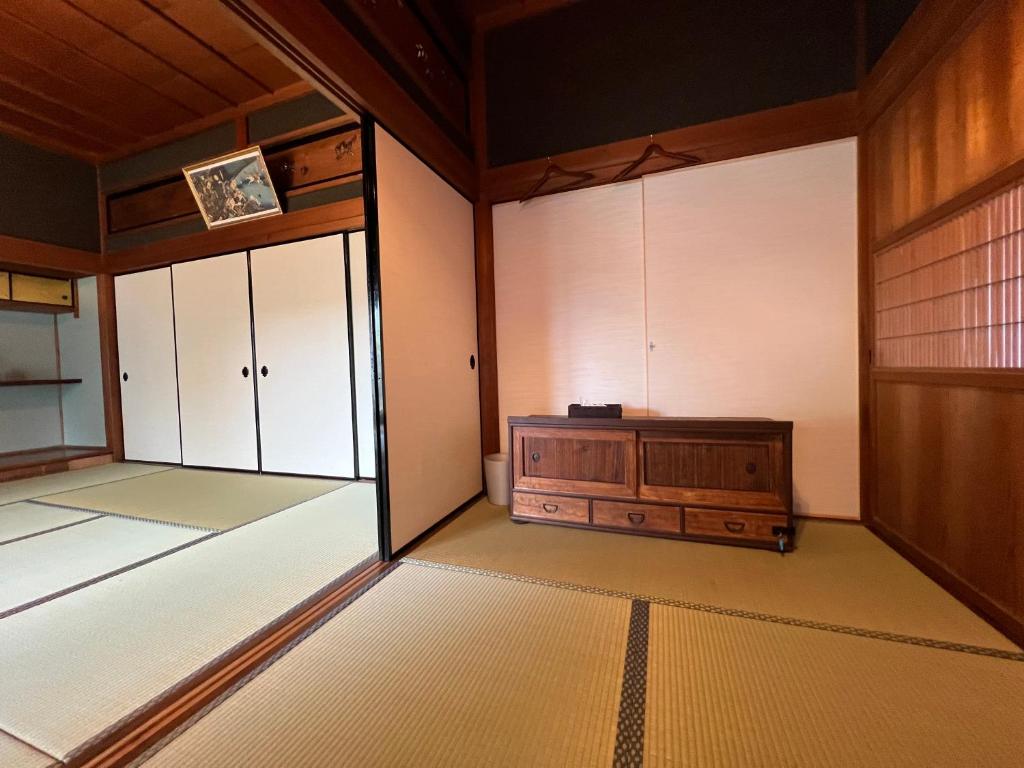 Postel nebo postele na pokoji v ubytování Guesthouse Usagi