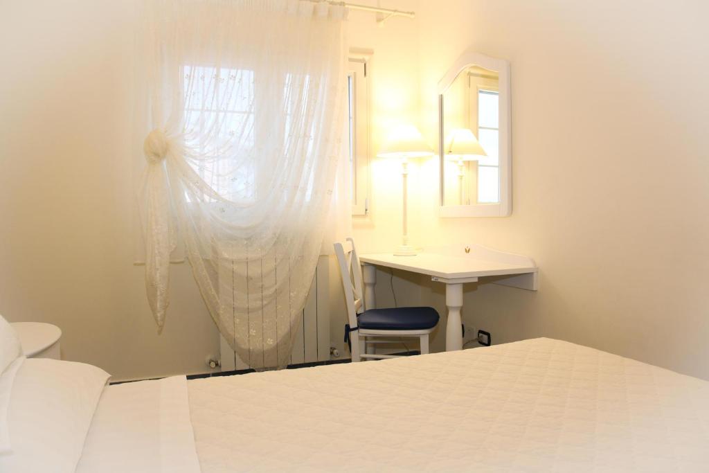 Posteľ alebo postele v izbe v ubytovaní Anthos Casa Vacanze
