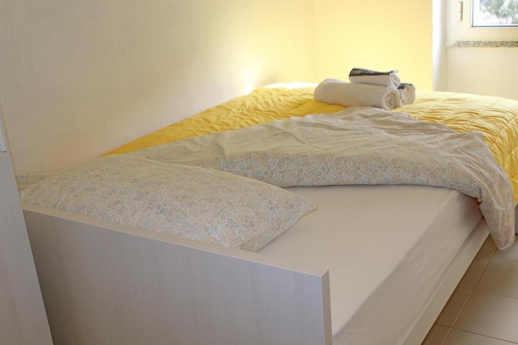 Postel nebo postele na pokoji v ubytování Caricia