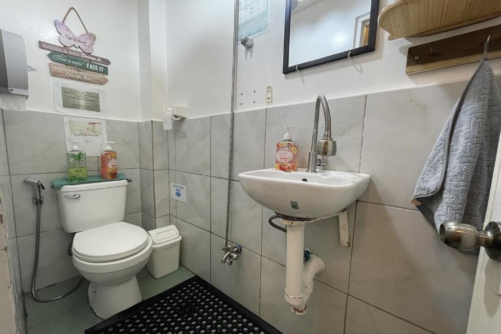 Koupelna v ubytování Balai Vivencio Hostel