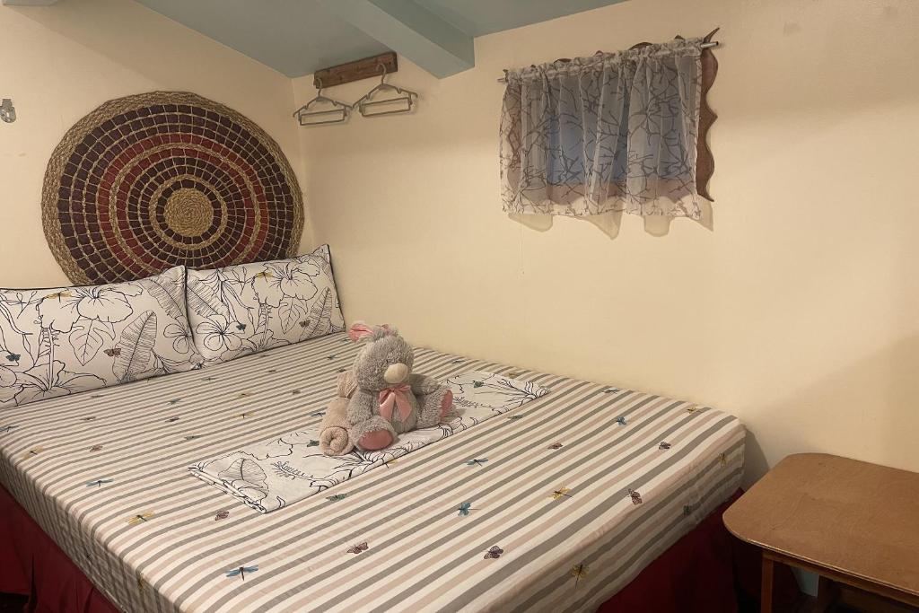 Postel nebo postele na pokoji v ubytování Balai Vivencio Hostel
