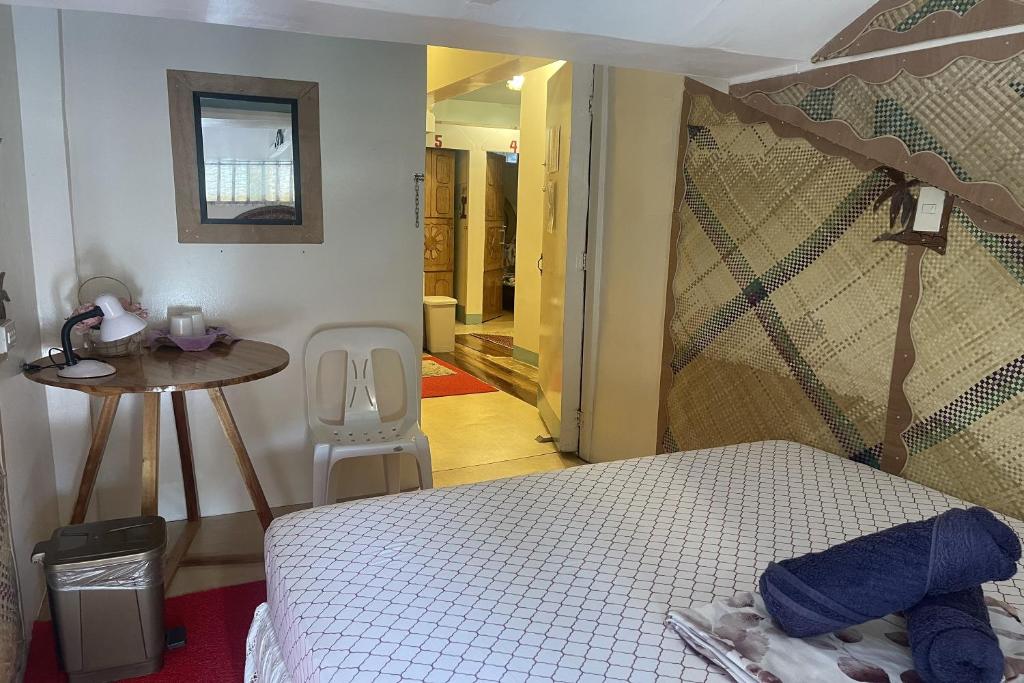 Postel nebo postele na pokoji v ubytování Balai Vivencio Hostel