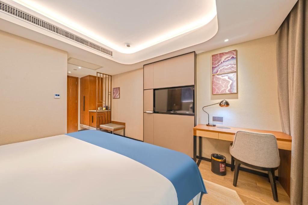 TV a/nebo společenská místnost v ubytování Yunfei Hotel - Shanghai Hongqiao Wuzhong Road Branch