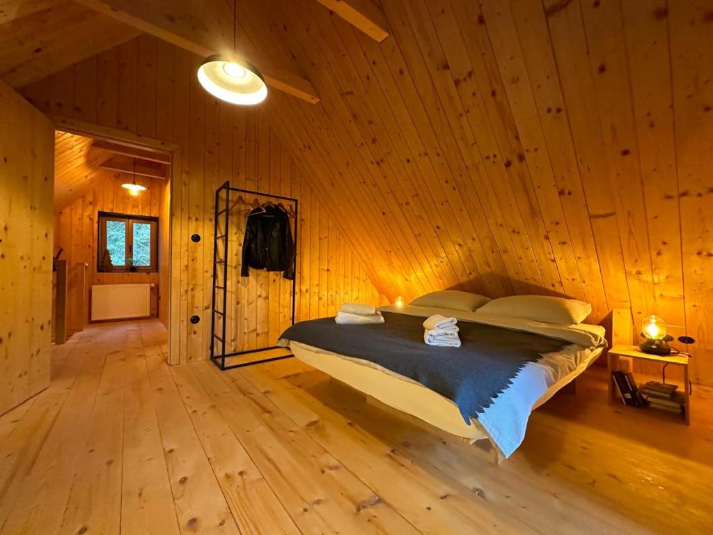 Postel nebo postele na pokoji v ubytování Cosy Lodge Pokljuka