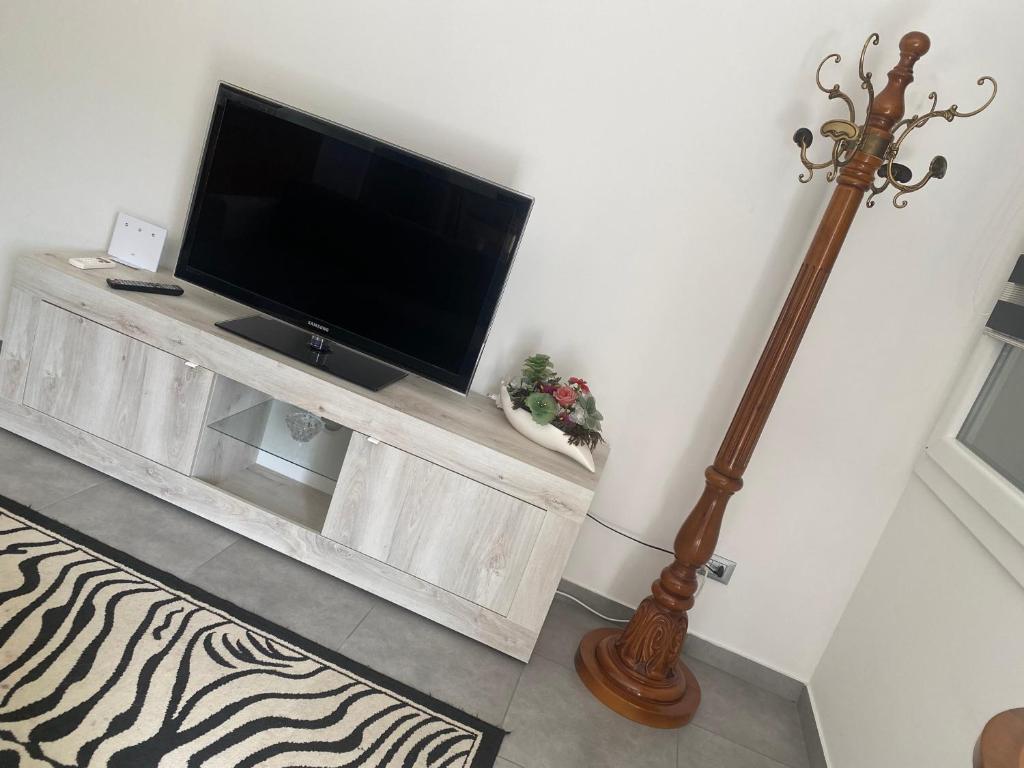TV a/nebo společenská místnost v ubytování Casa engy
