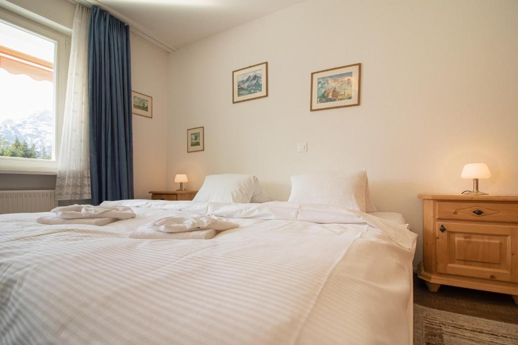 Postel nebo postele na pokoji v ubytování Viktoria A37 by Arosa Vacations
