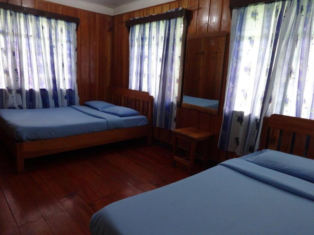 Postel nebo postele na pokoji v ubytování Saint Joseph Inn