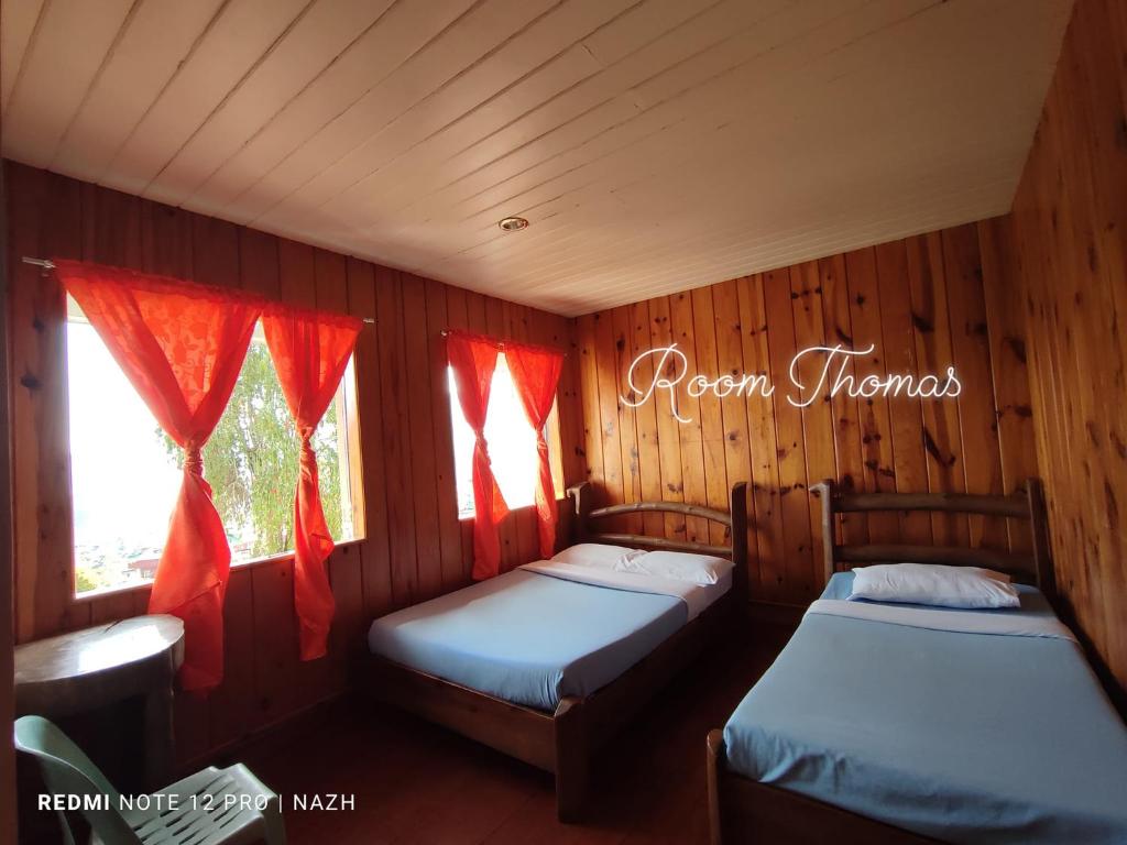 Postel nebo postele na pokoji v ubytování Saint Joseph Inn