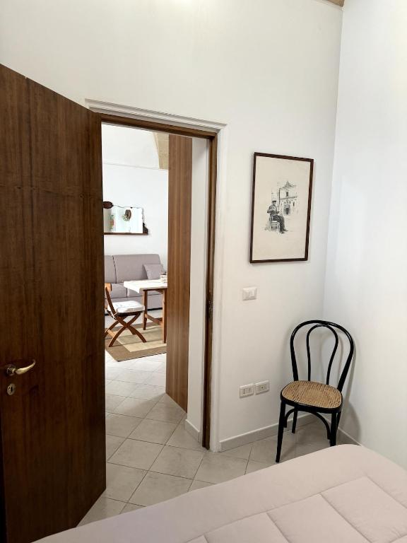 Łóżko lub łóżka w pokoju w obiekcie Artas la tua casa indipendente a Lecce