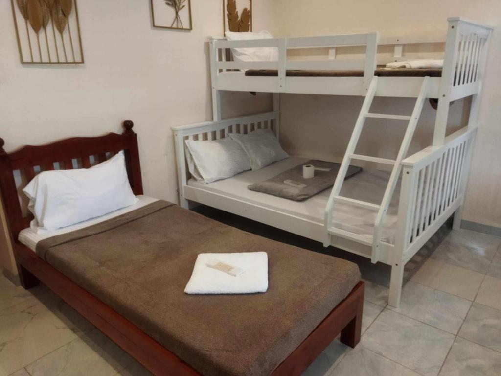 Postel nebo postele na pokoji v ubytování Elnora Delmar Travellers Inn