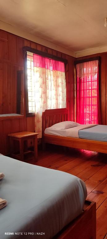 Postel nebo postele na pokoji v ubytování Saint Joseph Inn