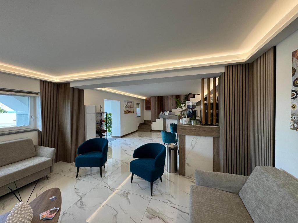 Posezení v ubytování Hotel Cocceio