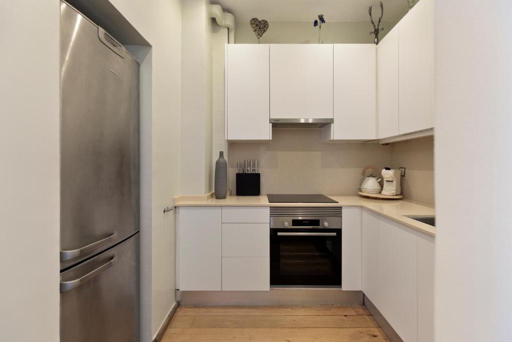 Kuchyňa alebo kuchynka v ubytovaní Enjoy Apartments Donna