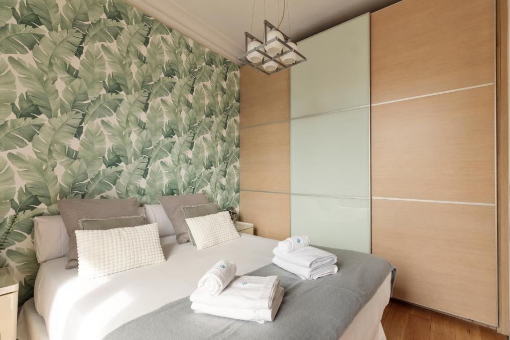 Posteľ alebo postele v izbe v ubytovaní Enjoy Apartments Donna
