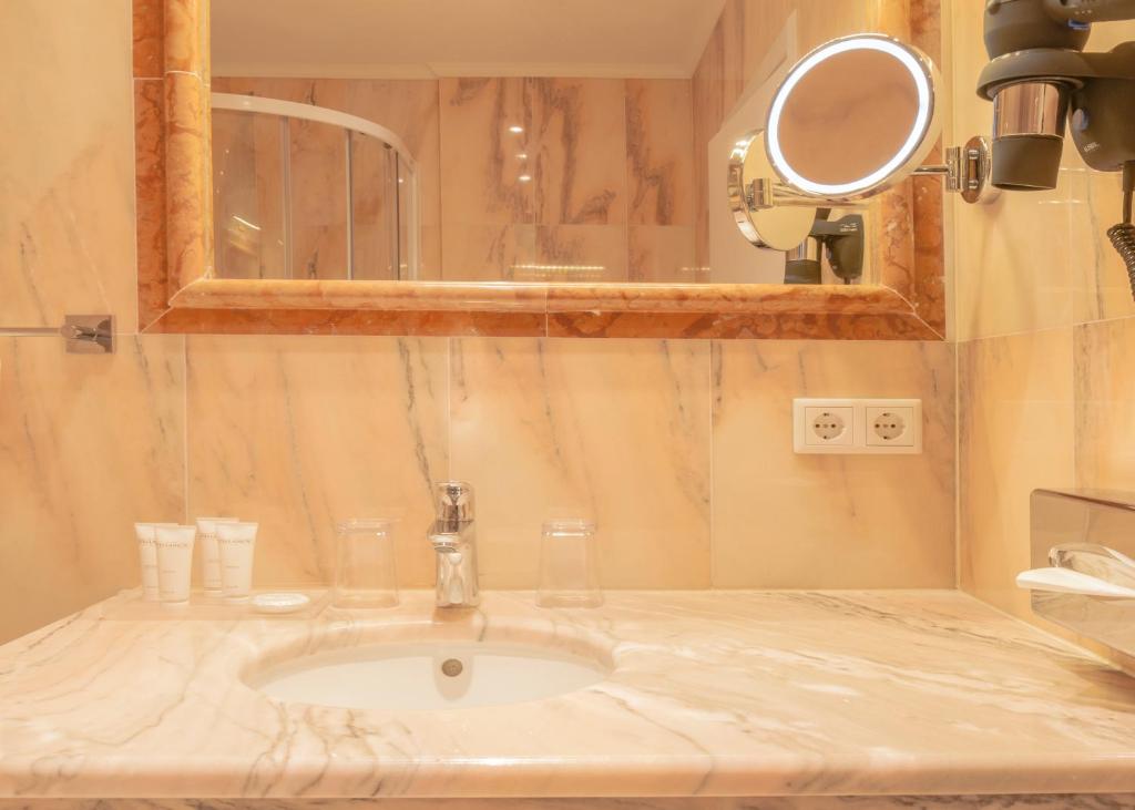 Koupelna v ubytování Grand Hotel Palladium
