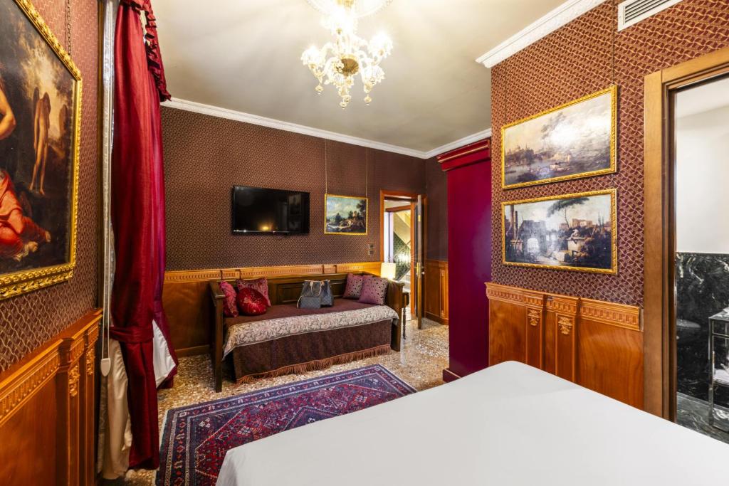 Postel nebo postele na pokoji v ubytování Hotel Casa Nicolò Priuli