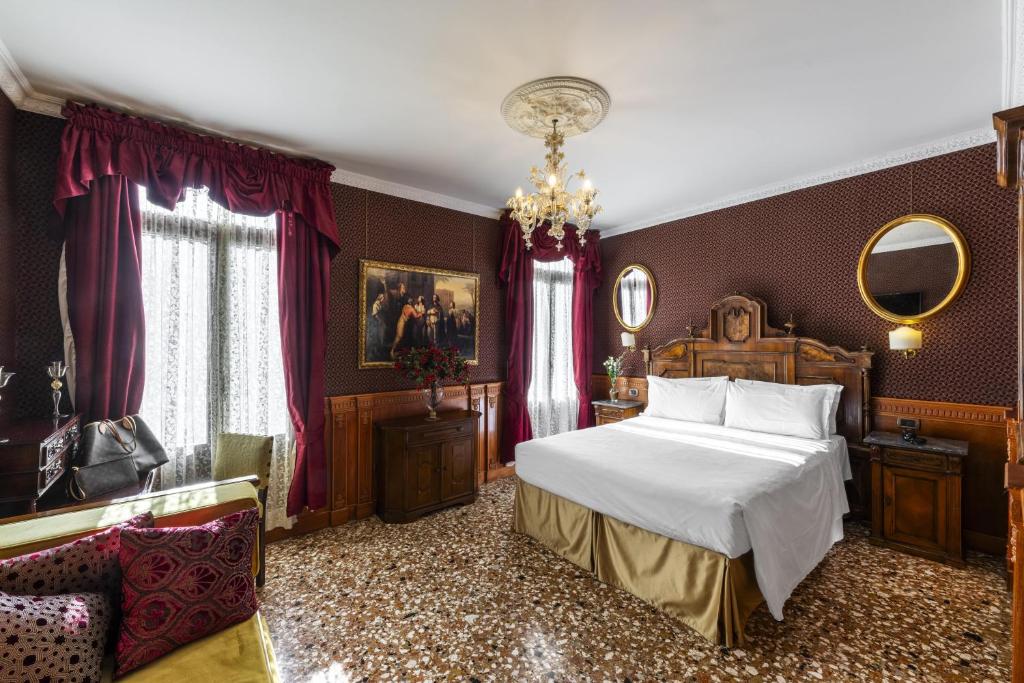 Postel nebo postele na pokoji v ubytování Hotel Casa Nicolò Priuli