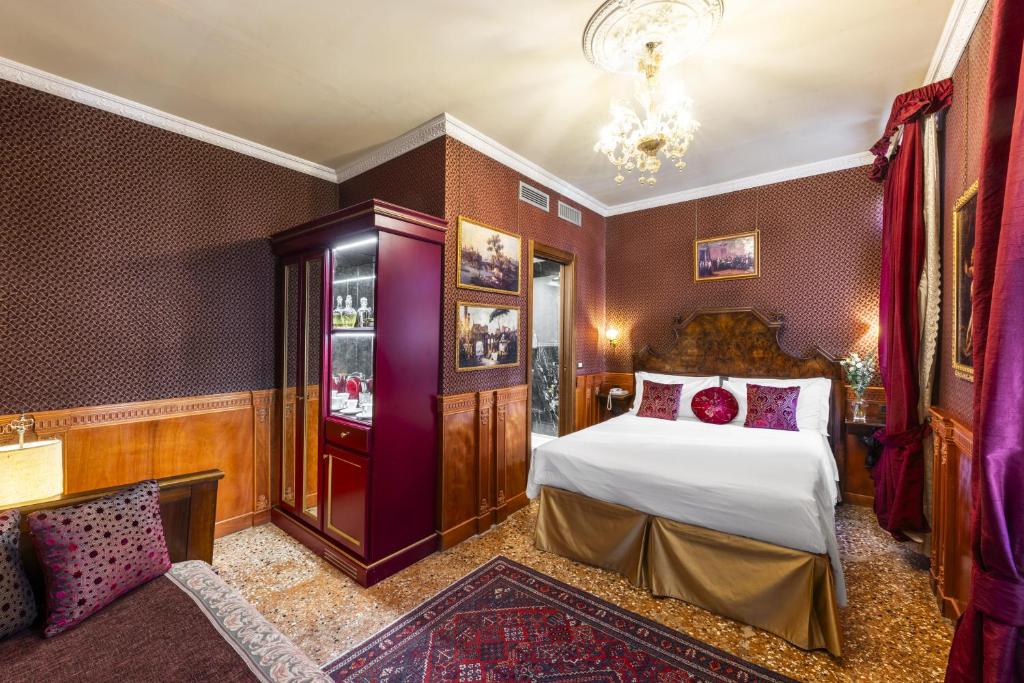 Postel nebo postele na pokoji v ubytování Hotel Casa Nicolò Priuli