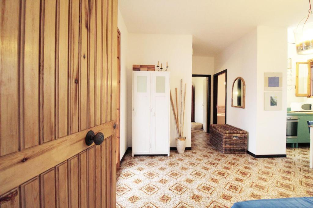 a hallway with a door and a room at Casa vacanza Orsa minore by Apulia home in Rivabella