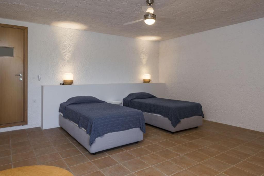 Posteľ alebo postele v izbe v ubytovaní Luxury Villa Near The Sea Meliti Luxury Villa