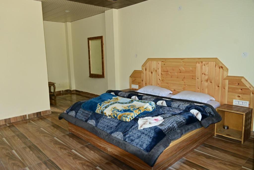 Letto o letti in una camera di Nomadic Den Manali