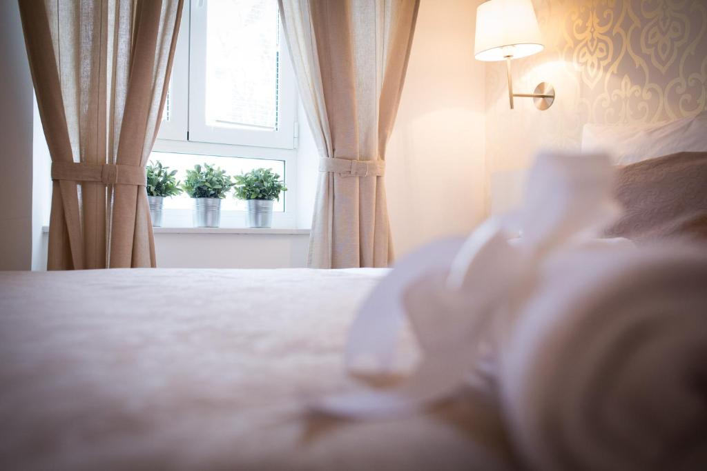 Postel nebo postele na pokoji v ubytování Casa Arancia