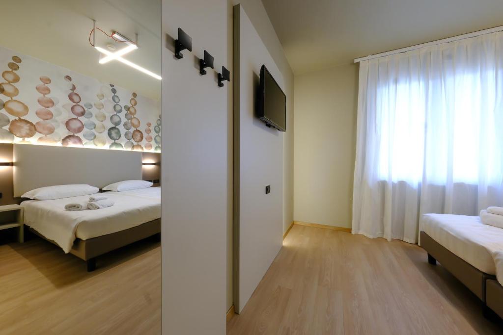 Postel nebo postele na pokoji v ubytování Villa Mimosa