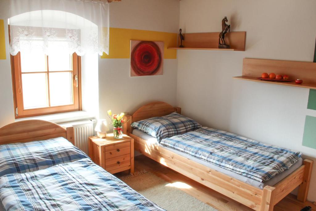 Postel nebo postele na pokoji v ubytování Gasthof Franzosenhof