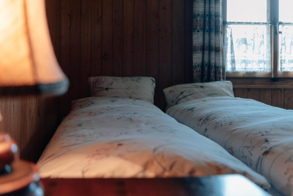 Postel nebo postele na pokoji v ubytování Landgasthof Paradiesli
