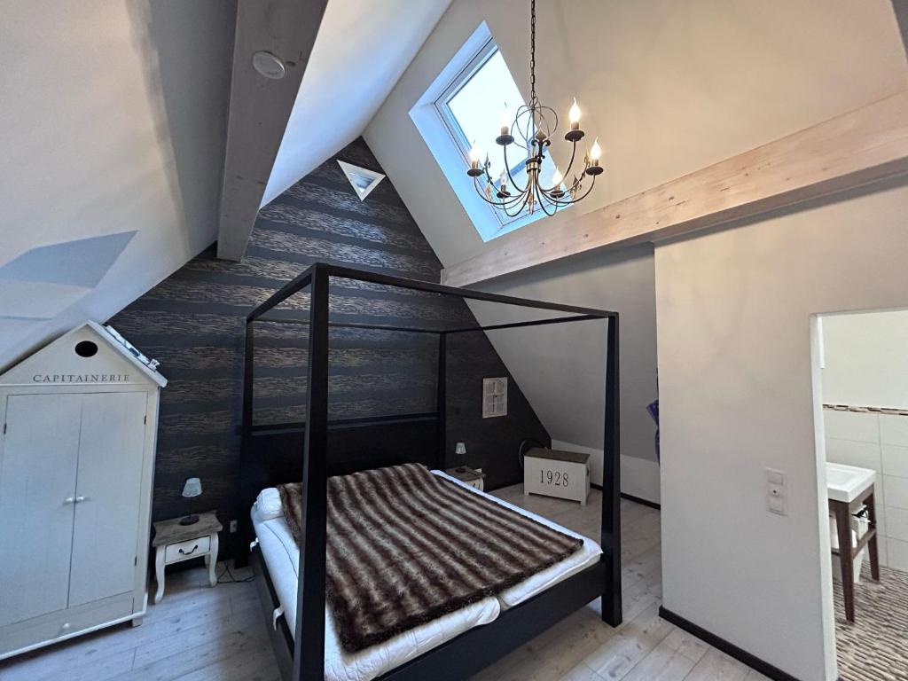 Ένα ή περισσότερα κρεβάτια σε δωμάτιο στο Altstadtloft am Kaulberg
