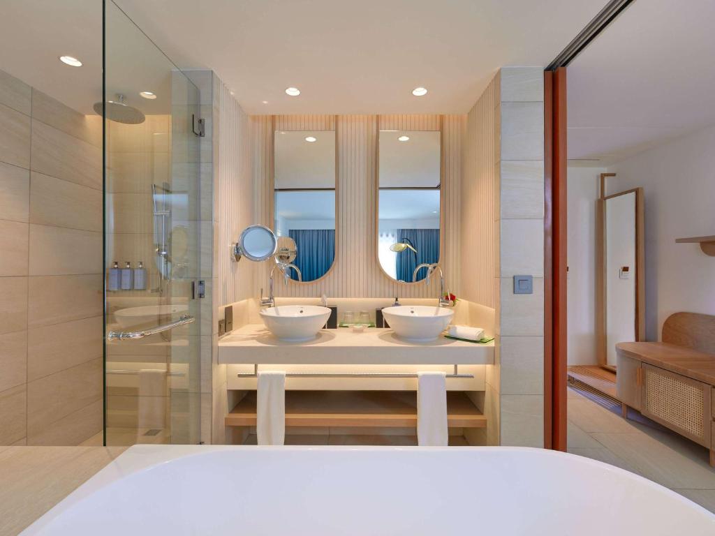 Postel nebo postele na pokoji v ubytování Sofitel Mauritius L'Imperial Resort & Spa