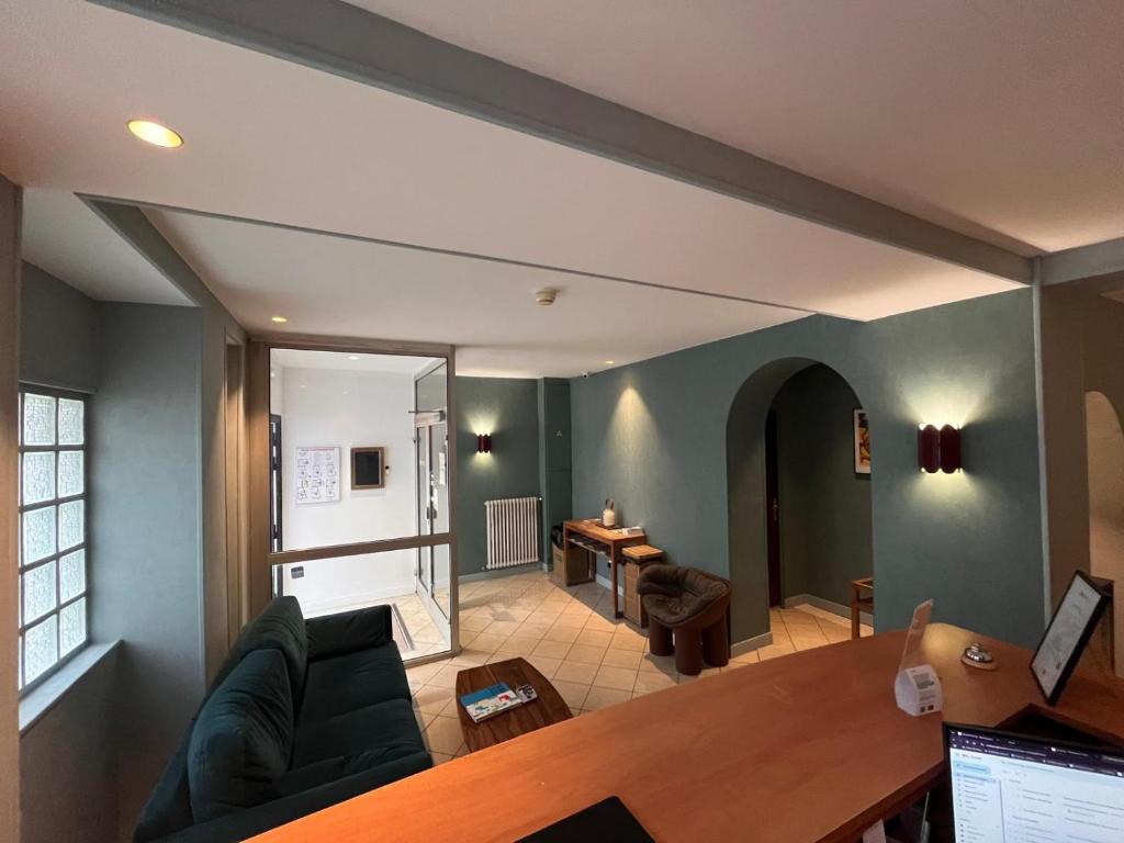 Posezení v ubytování Merryl Hotel