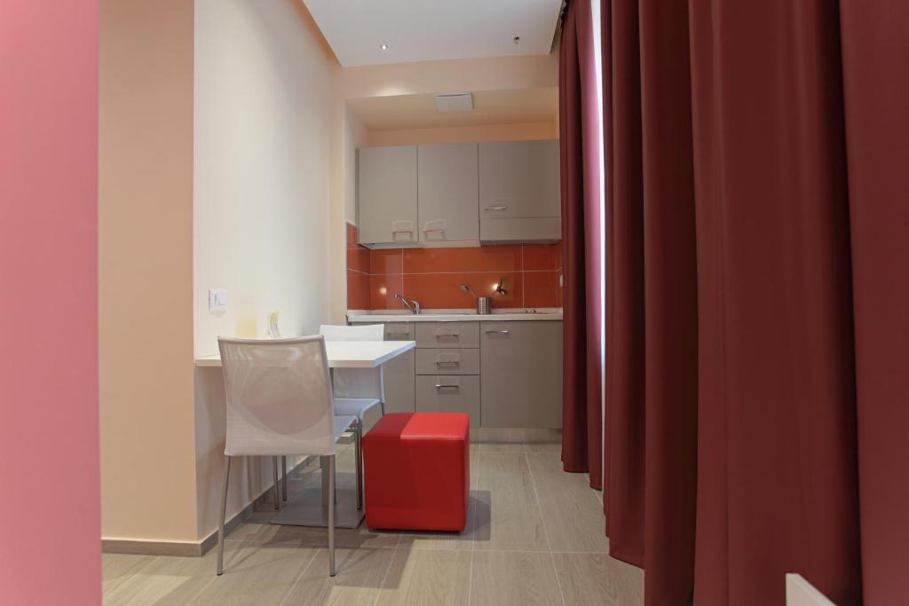 Kuchyň nebo kuchyňský kout v ubytování Hotel Agrigento Home