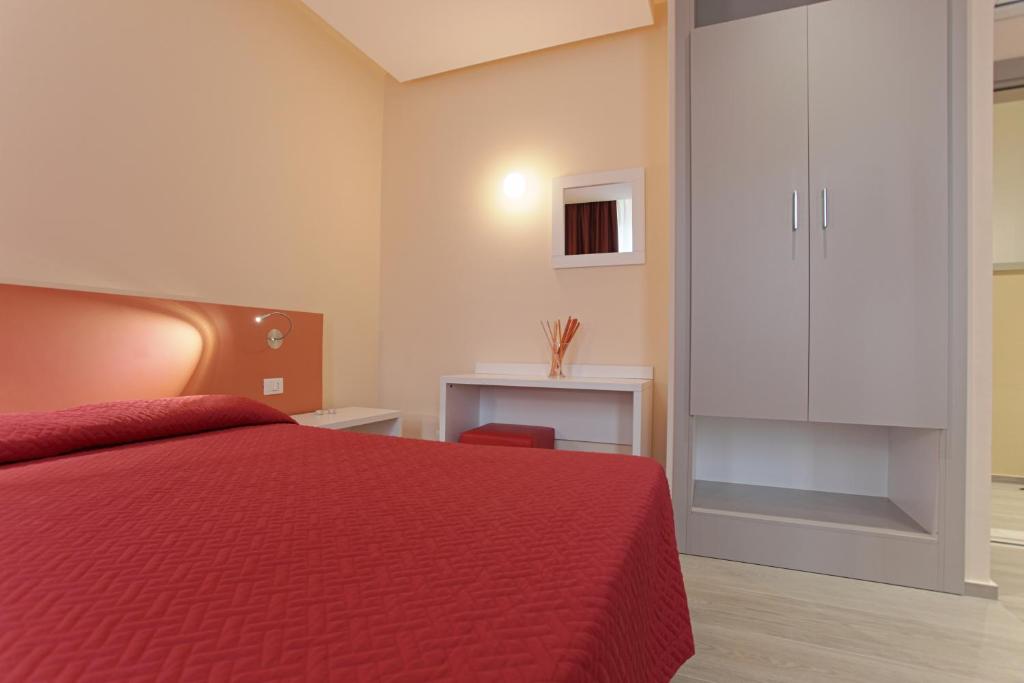 Postel nebo postele na pokoji v ubytování Hotel Agrigento Home
