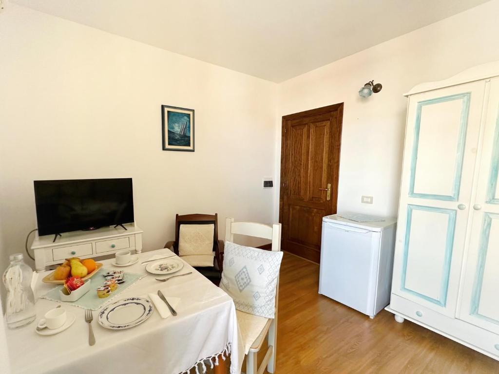 TV a/nebo společenská místnost v ubytování B&B Tre - Rooms & Relax