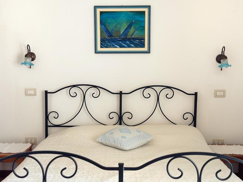 Postel nebo postele na pokoji v ubytování B&B Tre - Rooms & Relax
