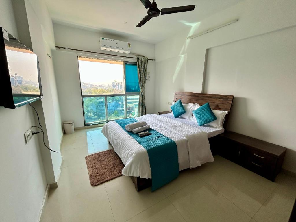 Postel nebo postele na pokoji v ubytování Zenith Homes - Boomerang Suites
