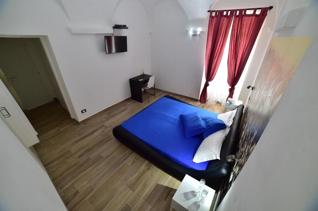 Postel nebo postele na pokoji v ubytování Suite Varigotti