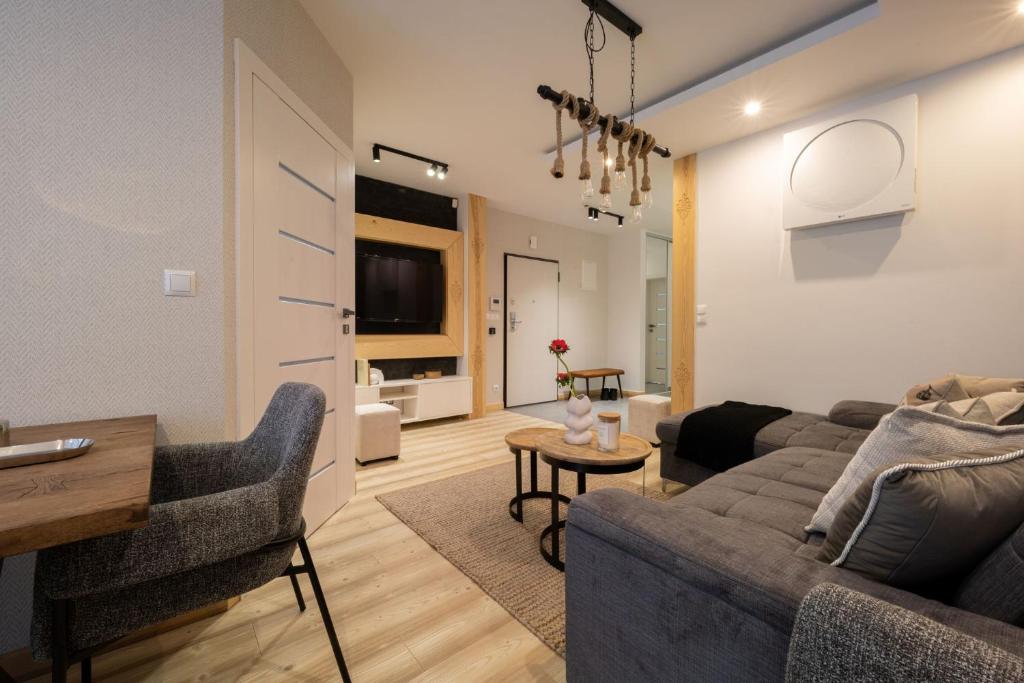 Posedenie v ubytovaní Prestige Apartamenty Stara Polana & SPA2