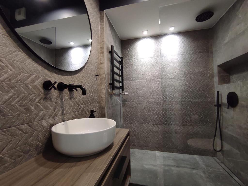 Kúpeľňa v ubytovaní Easy Rent Apartments - Unia Art Residence 83
