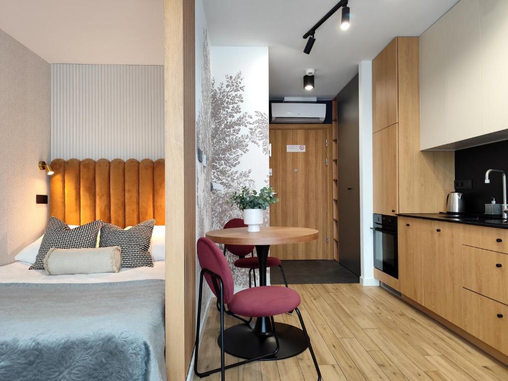 Kuchyňa alebo kuchynka v ubytovaní Easy Rent Apartments - Unia Art Residence 83