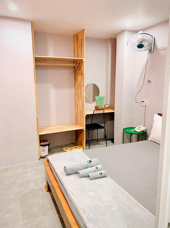 Postel nebo postele na pokoji v ubytování MEKONG HUB Hotel