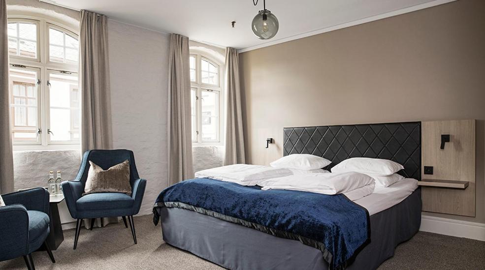 Postel nebo postele na pokoji v ubytování Hotel Brosundet