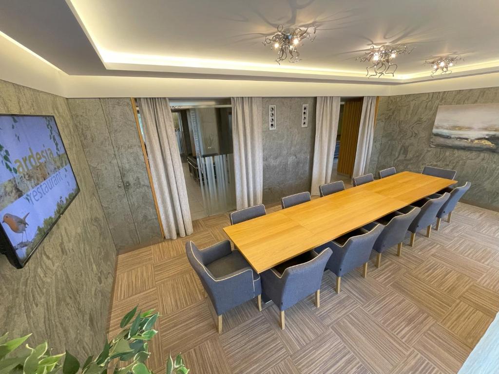 TV a/nebo společenská místnost v ubytování Hotel Bartoš