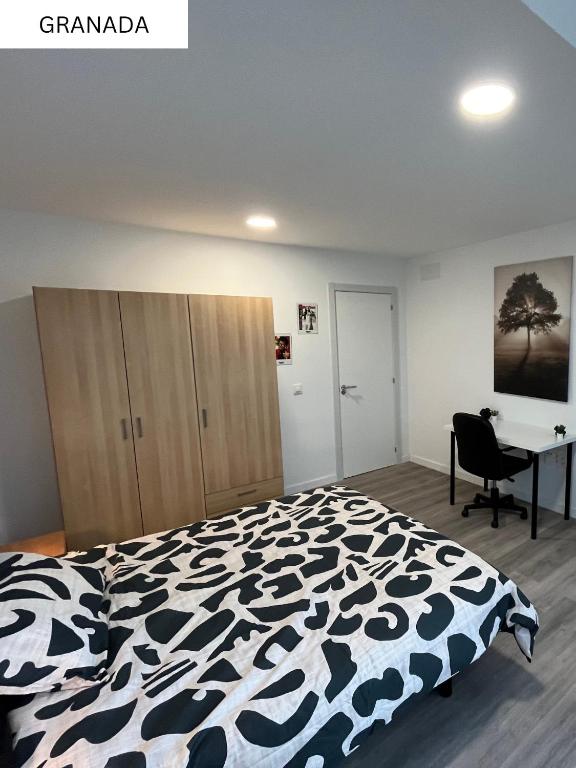 Postel nebo postele na pokoji v ubytování CoLiving El Juan