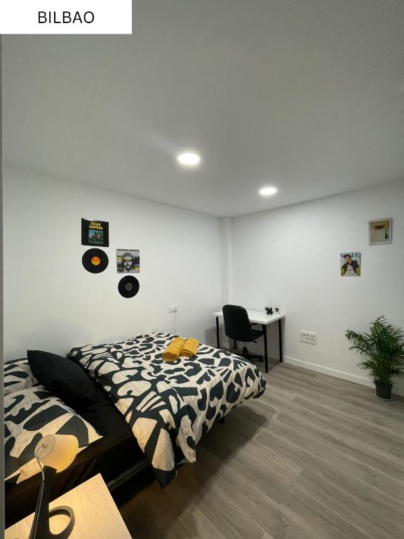 Postel nebo postele na pokoji v ubytování CoLiving El Juan