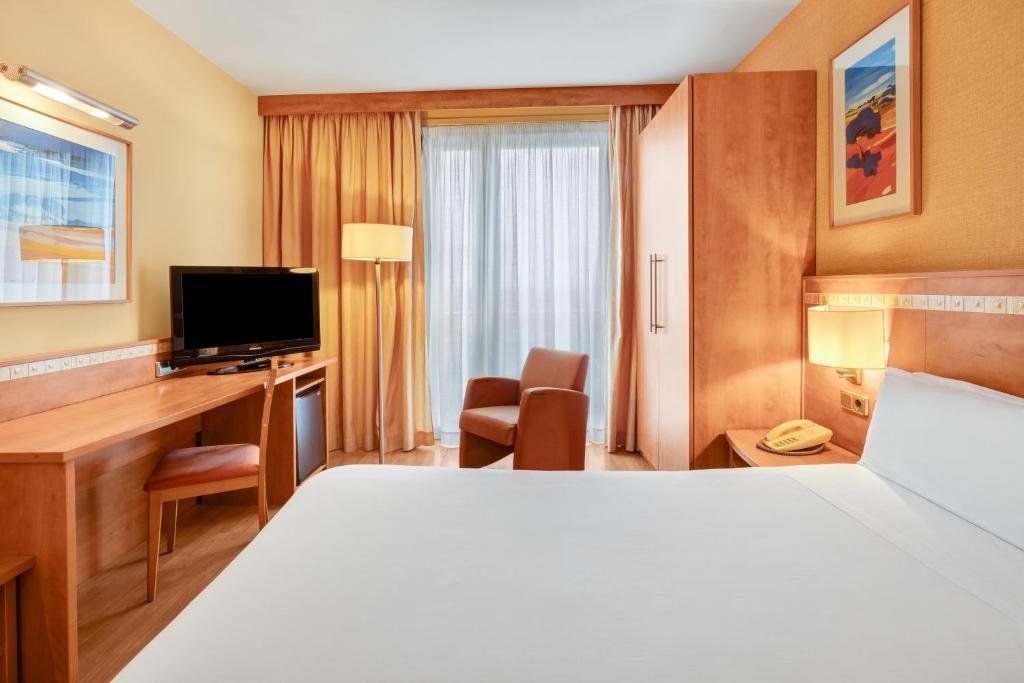Postel nebo postele na pokoji v ubytování B&B HOTEL Tarragona Valls